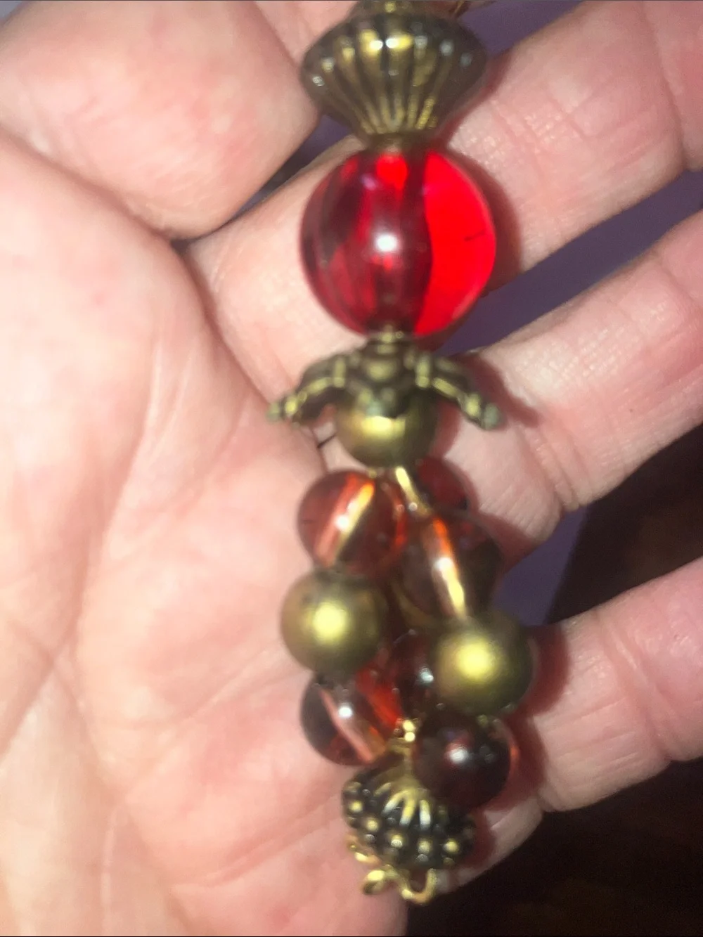 Handcrafted upcycled vintage long wire pierced red and bronze bead earrings - Picture 3 of 5